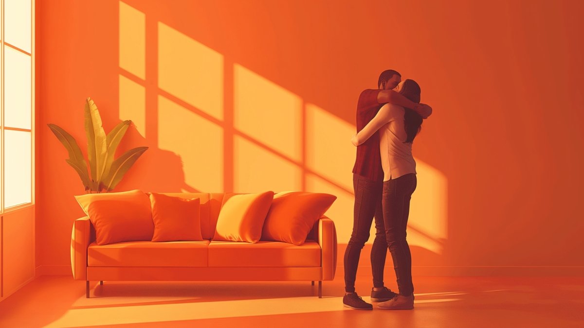 Couple hugging each other at home, sharing a happy and strong relationship