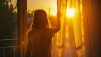 Girl opening window curtain to welcome a new beginning