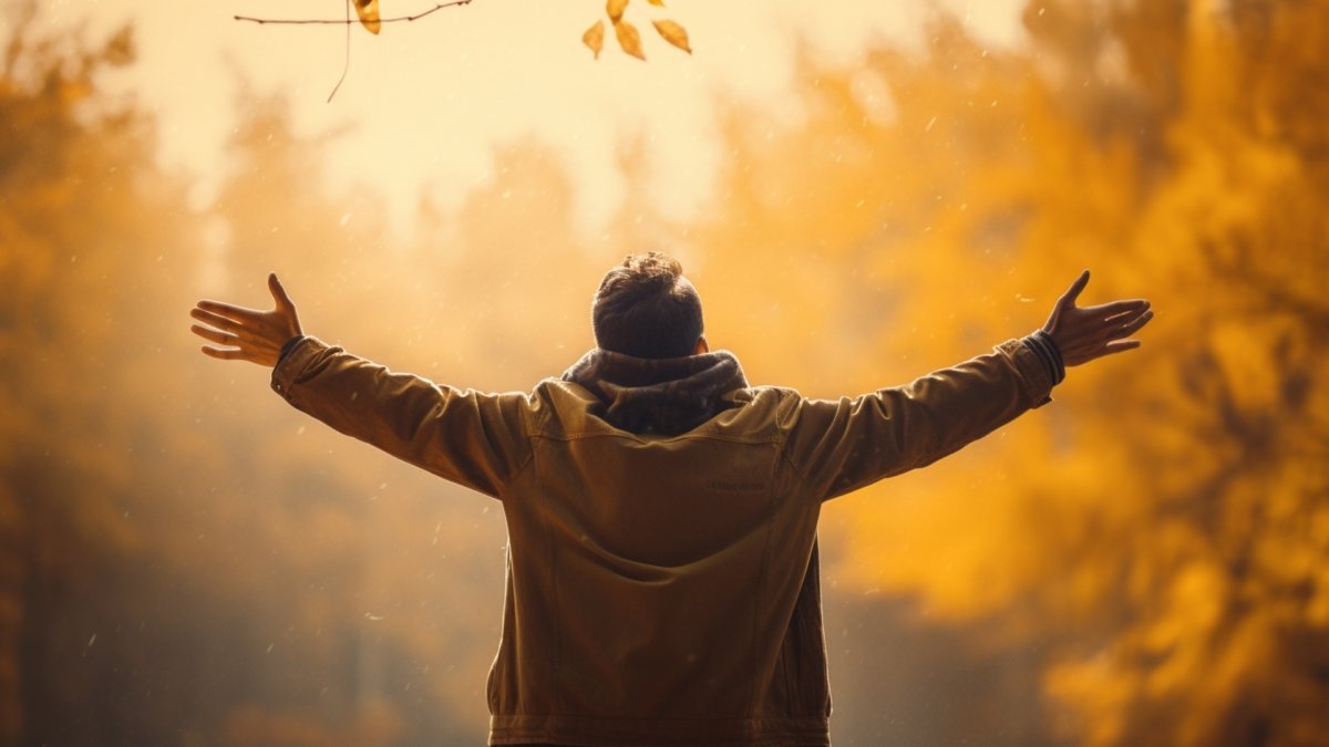 man showing gratitude with open arms for this life