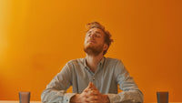 Man sitting on job desk using Wednesday blessings to find peace and purpose