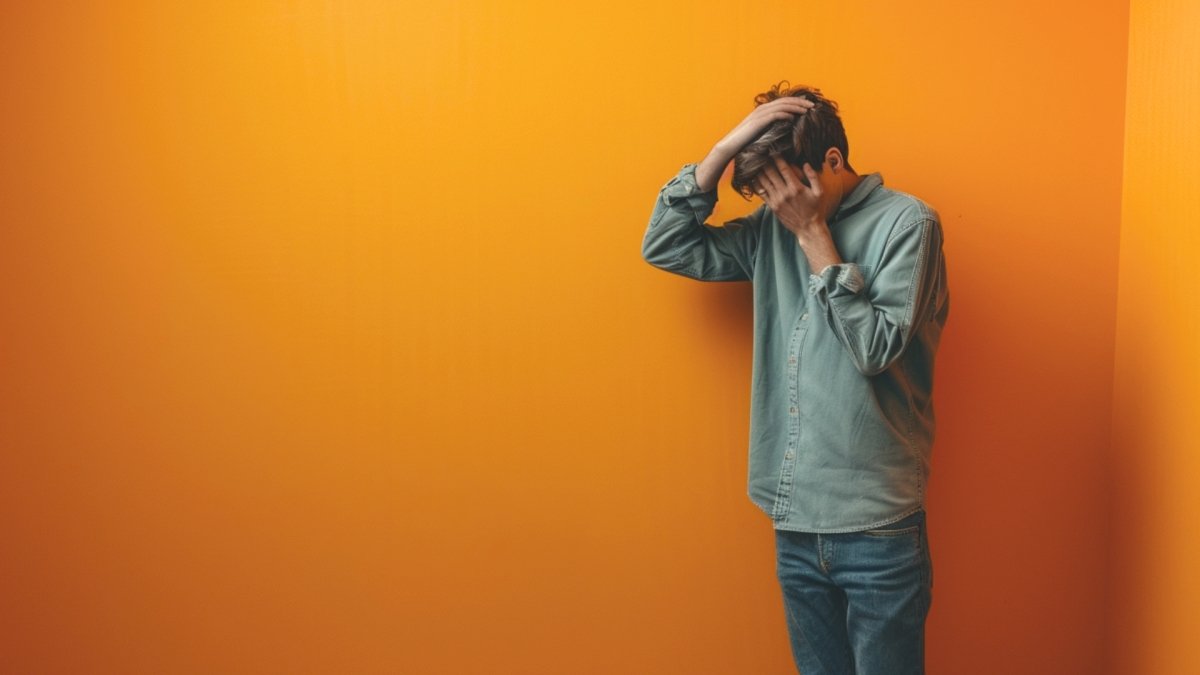 Man standing in a corner dealing with Trauma Triggers